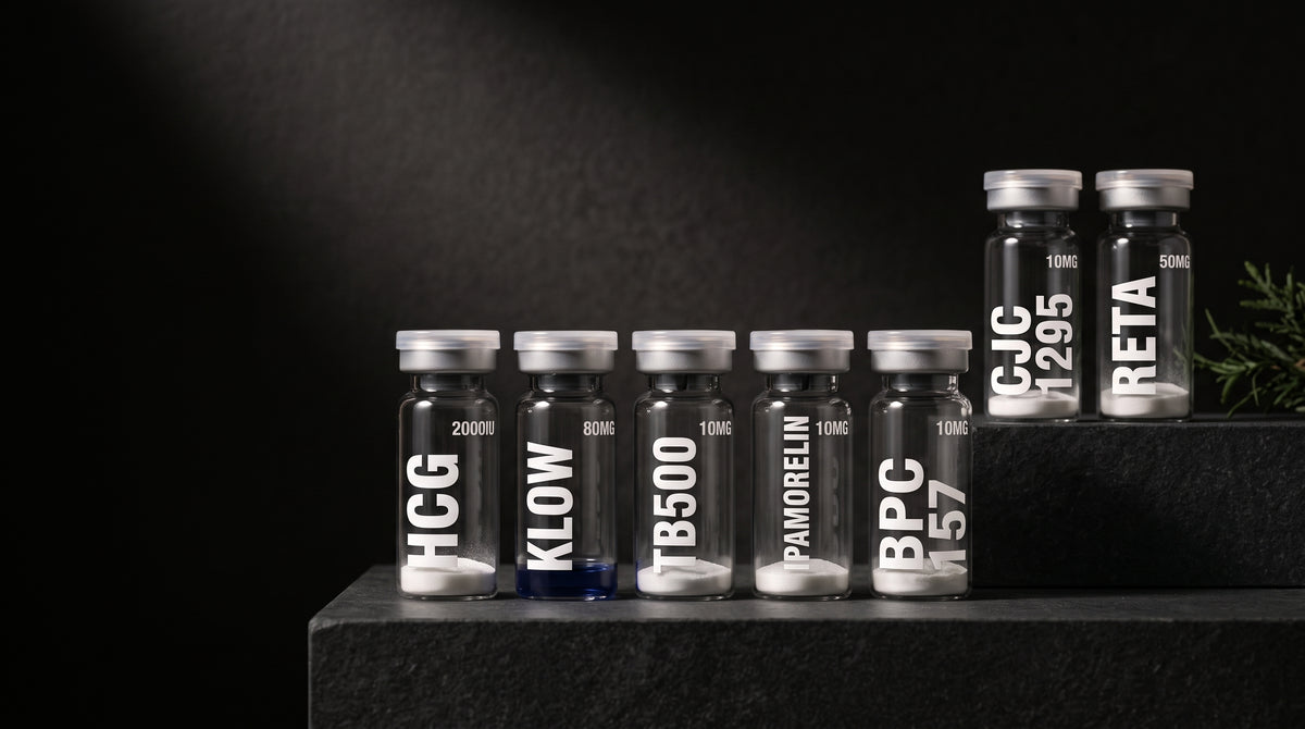 AURELIA research compound vials lined on dark stone, dark hero