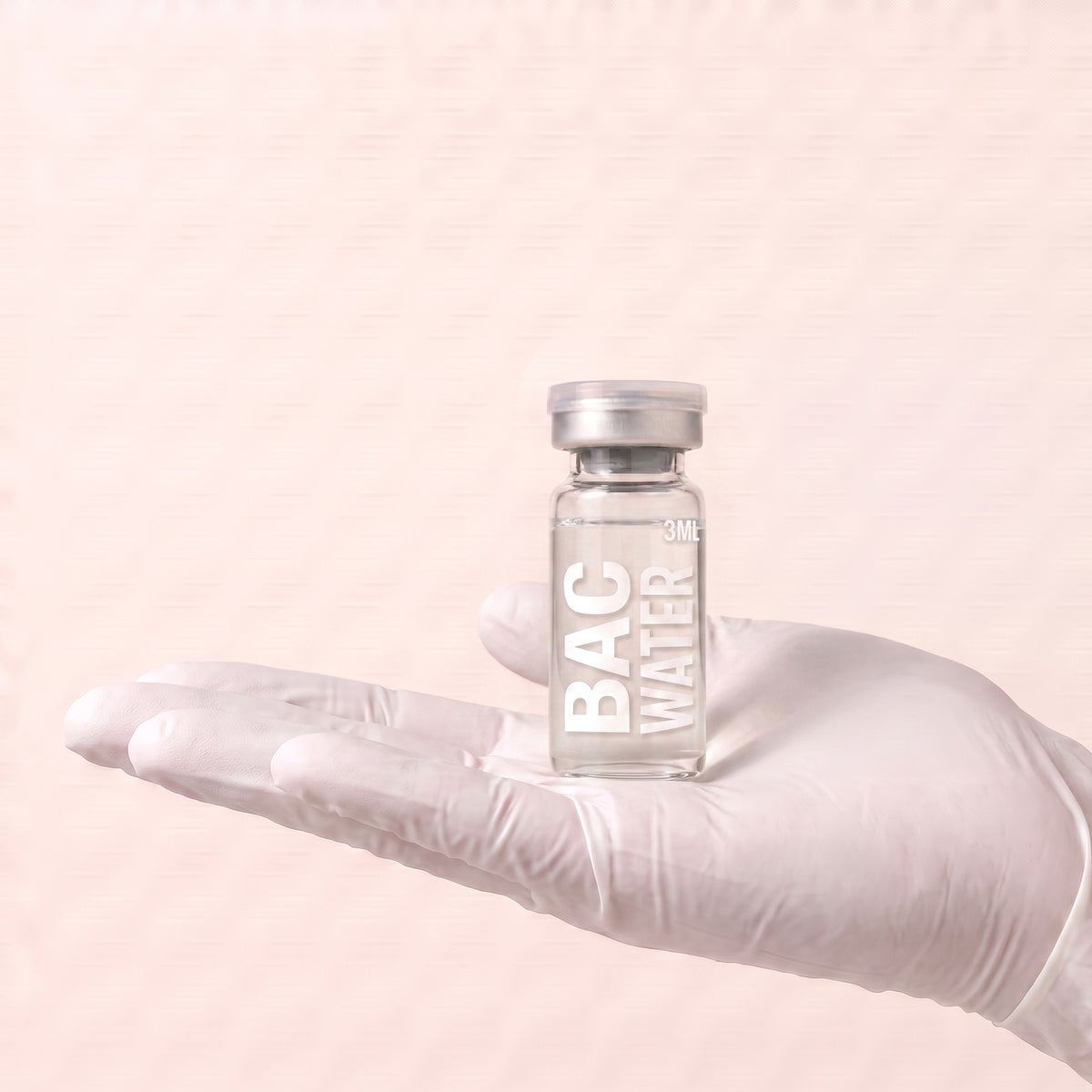 AURELIA bacteriostatic water 3ml vial held in a gloved hand, showing the vial size, for laboratory research use only