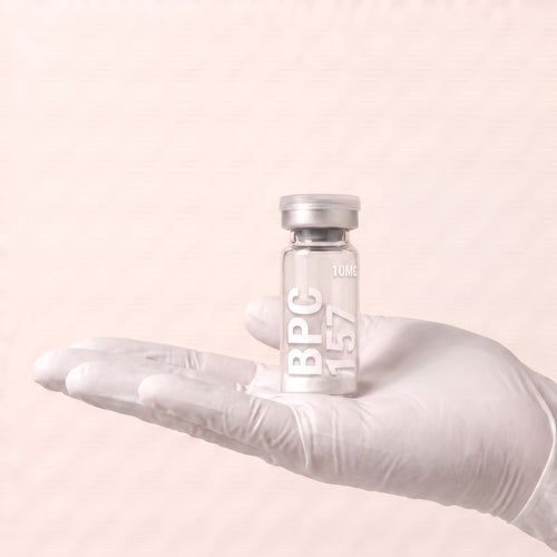 AURELIA BPC-157 10mg research peptide vial held in a gloved hand, showing the 3ml vial size, research use only
