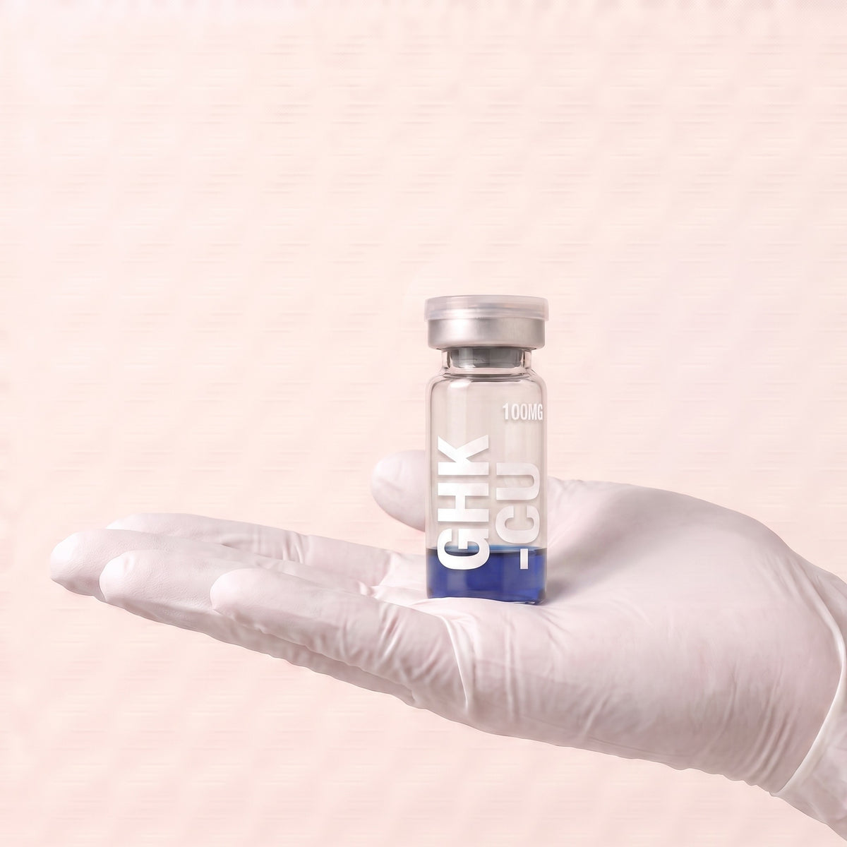 AURELIA GHK-Cu 100mg copper tripeptide research compound vial held in a gloved hand, showing the 3ml vial size, research use only
