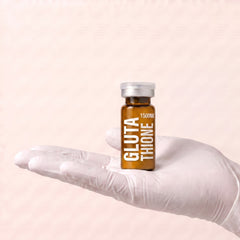 AURELIA Glutathione 1500mg amber glass research compound vial held in a gloved hand, showing the 10ml vial size, research use only
